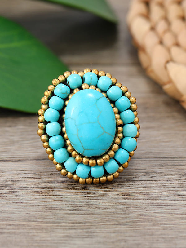 Anello in tessuto turchese