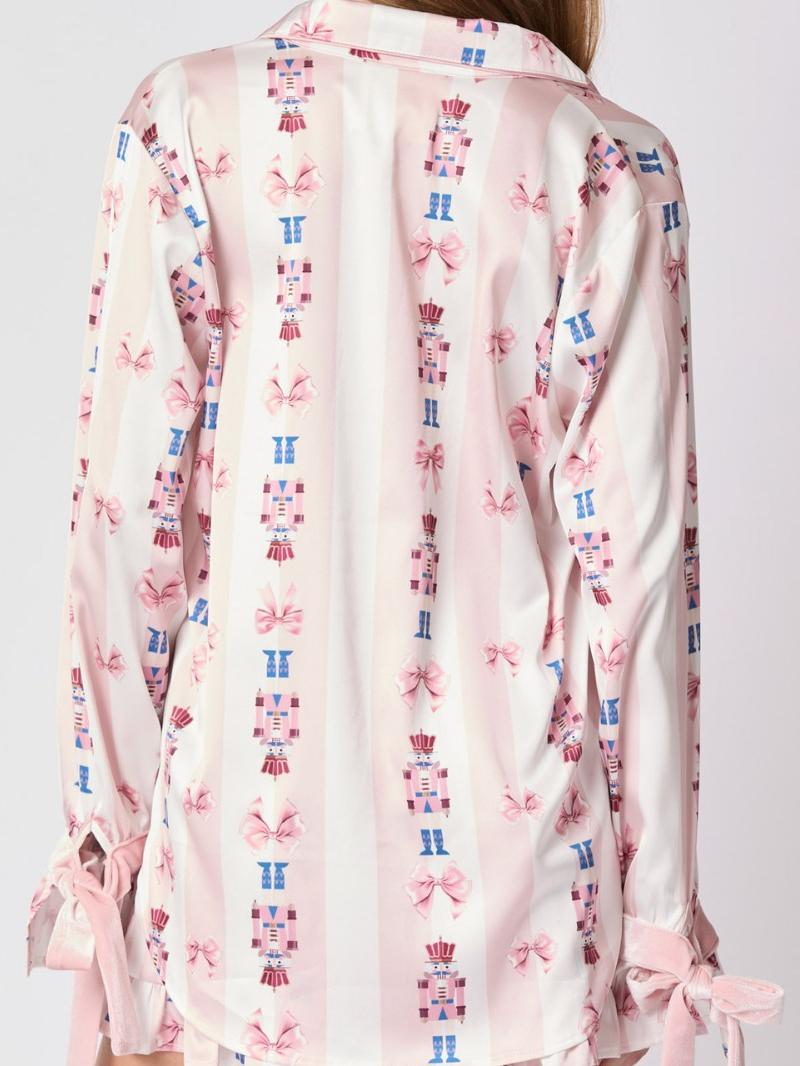 Roze pyjamaset met strikmanchetten