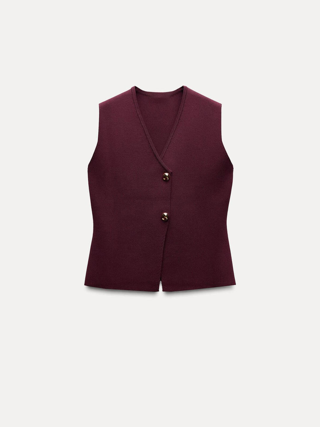 Knitted Vest At Pleated Skirt