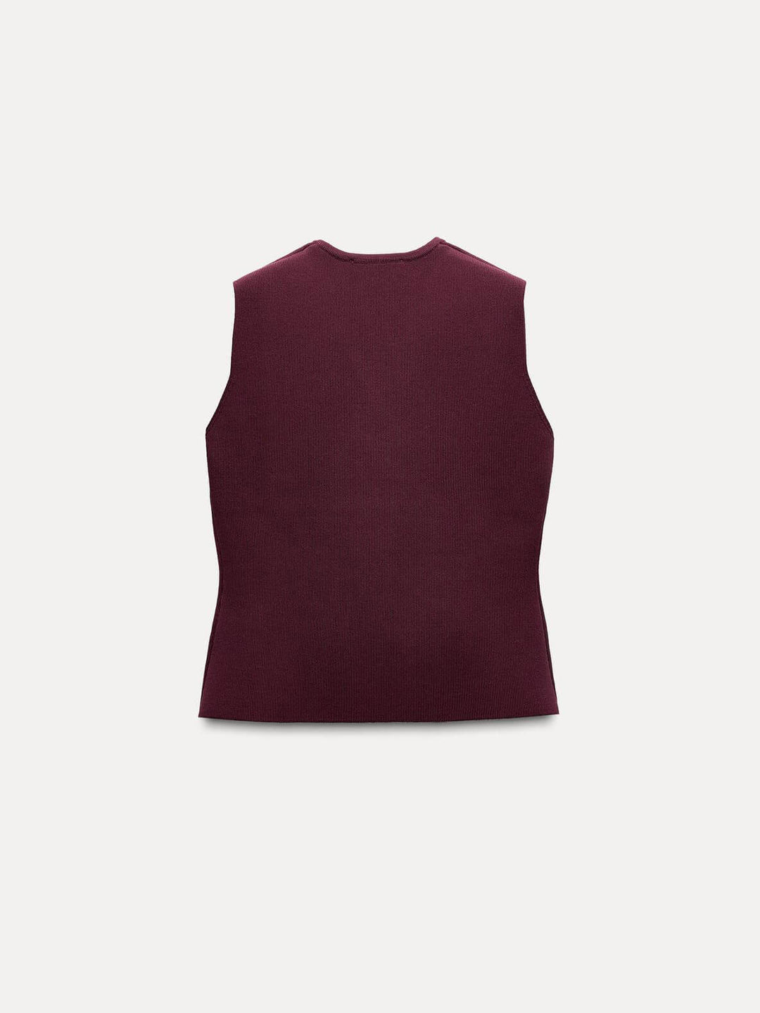 Knitted Vest At Pleated Skirt