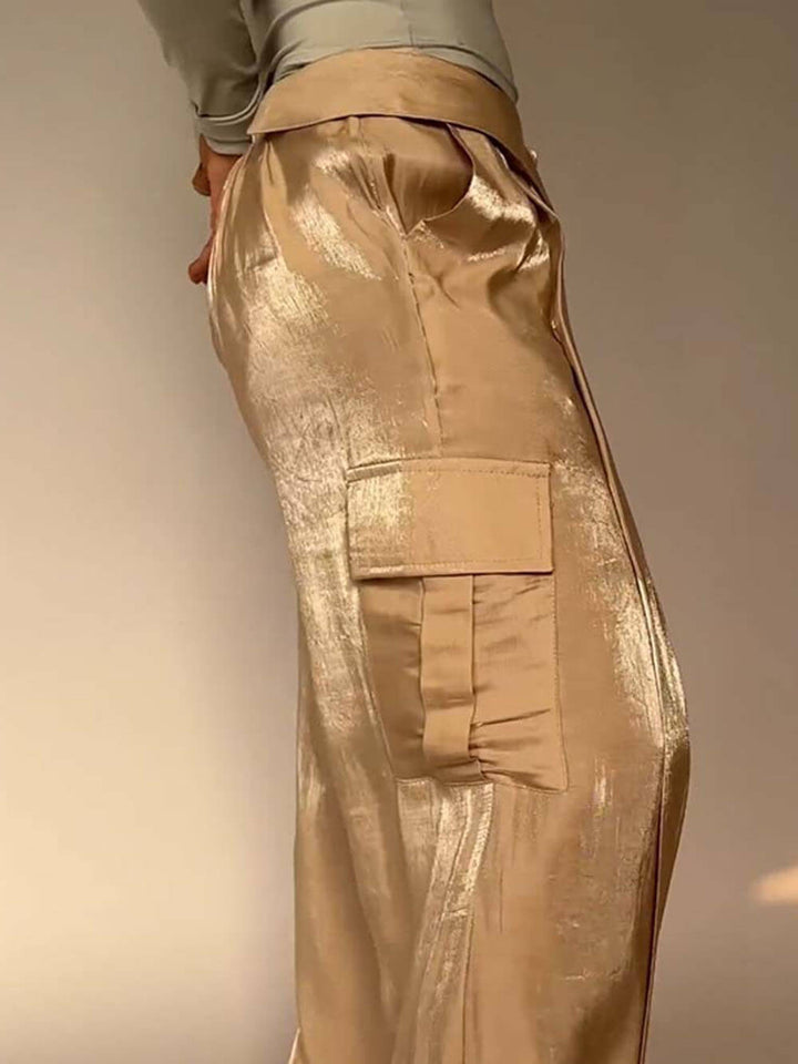Spodnie z szerokimi nogawkami i kieszeniami ze złotej tkaniny w talii ze sznurkiem