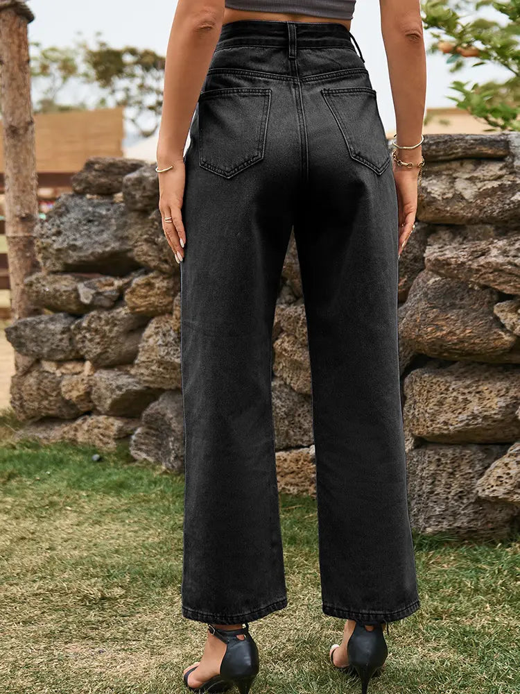 Pantaloni in denim lavato con orlo spaccato alla moda