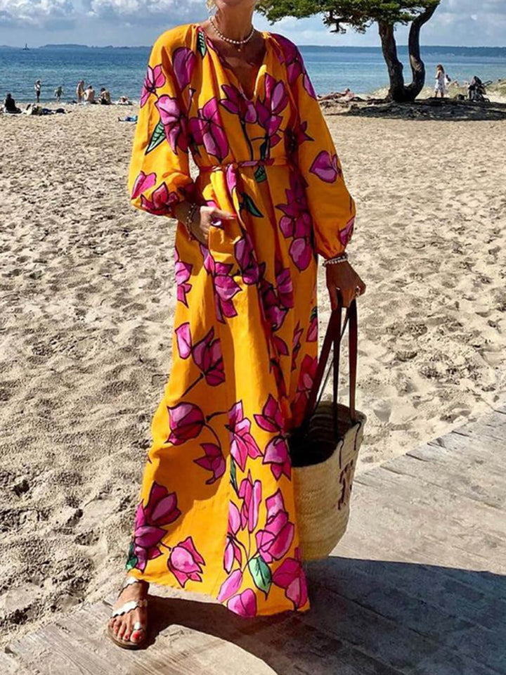 Φορέματα για διακοπές στην παραλία με στάμπα με V λαιμόκοψη