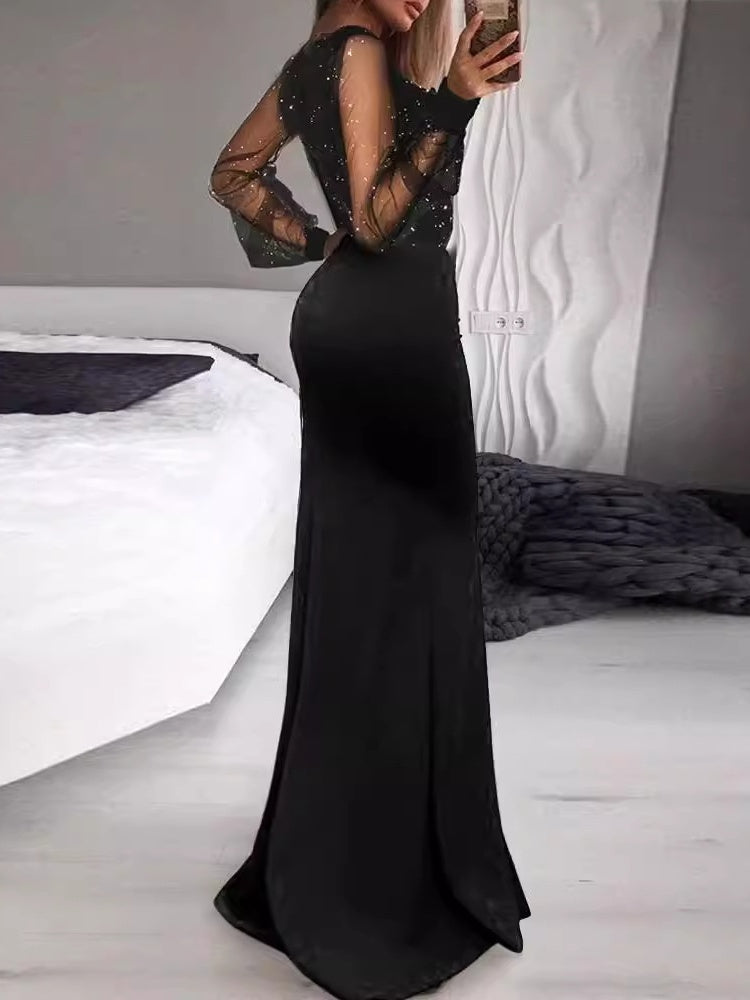 Robe moulante noire à panneaux transparents