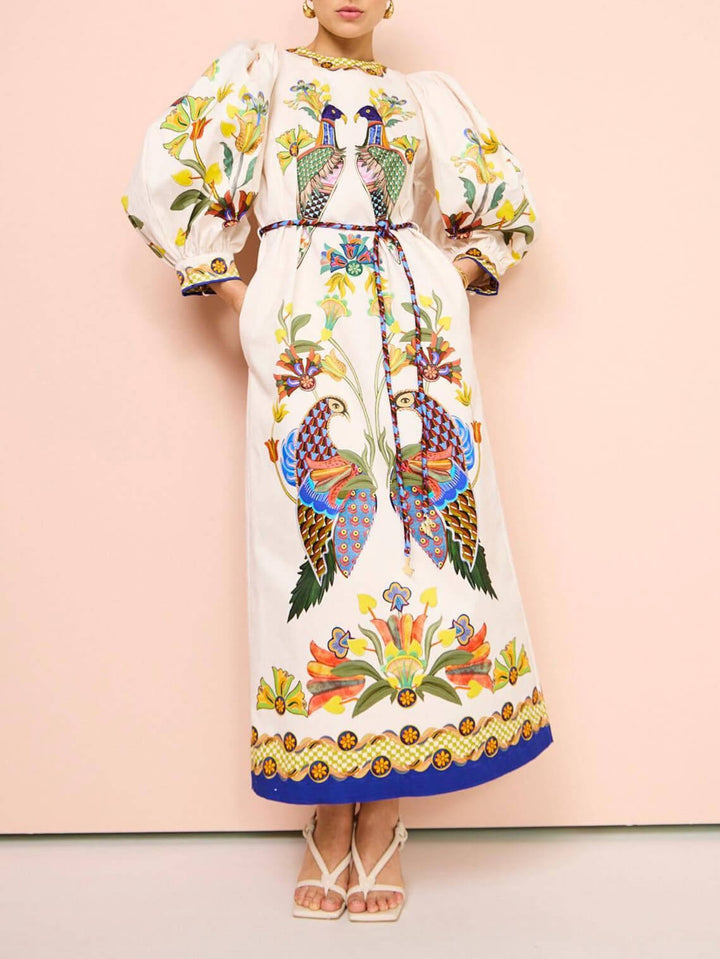 Prachtige en leuke losse, casual midi-jurk met pofmouwen en print