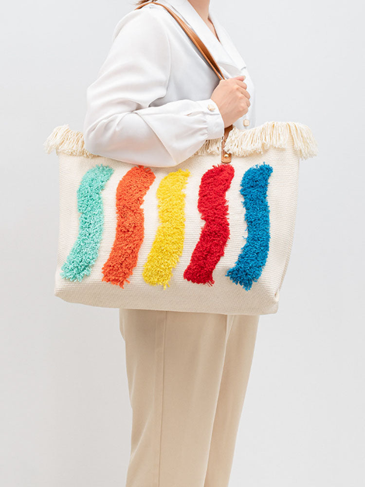 Bolsa de tela con patrón de arcoíris bordado