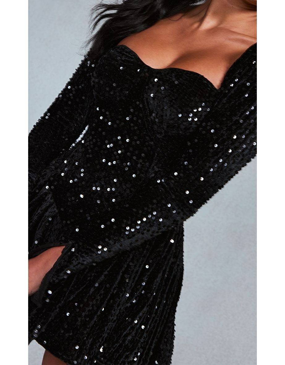 Czarna cekinowa mini sukienka z długim rękawem i detalami w kształcie miseczek