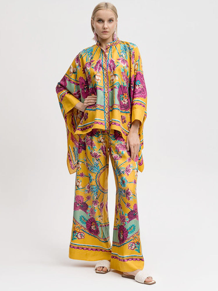 Moderne asymmetrisk print top og bukser sæt