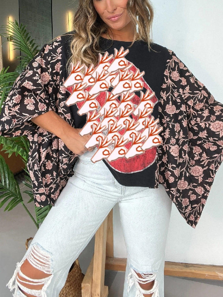 Blusa estampada con mangas murciélago