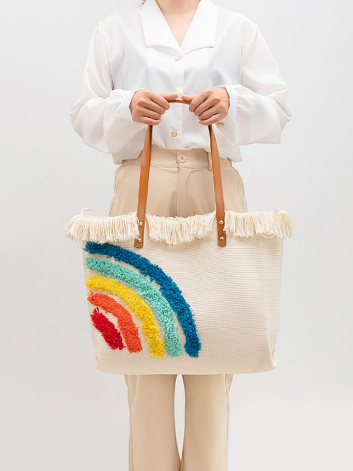 mulepose med broderet regnbuemønster