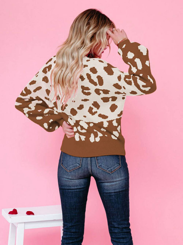 Suéter de punto con cuello redondo y estampado de leopardo elegante