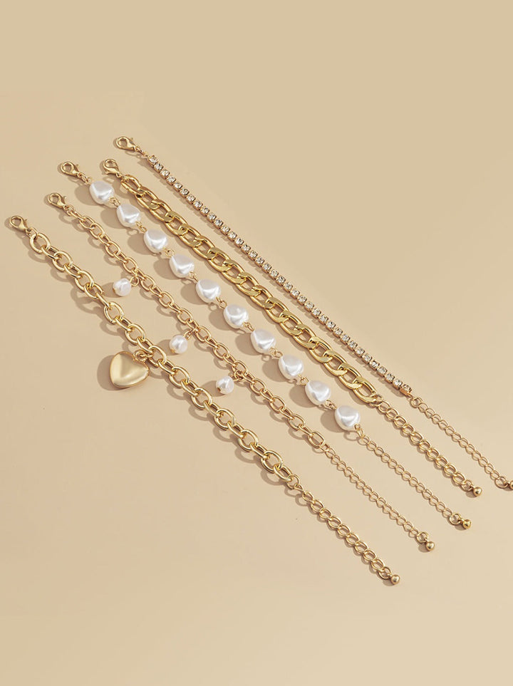 Ensemble de bracelets superposés avec chaîne en métal et perles