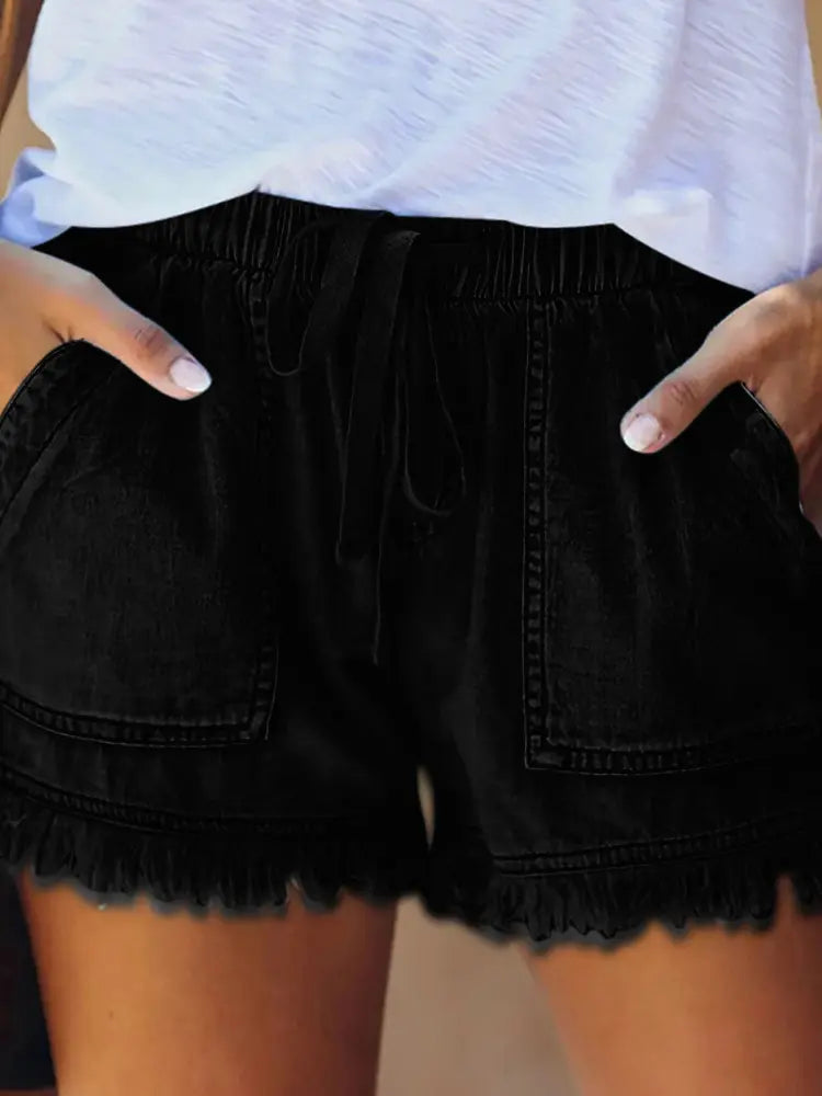 Högmidjade dragsko slimmande denimshorts