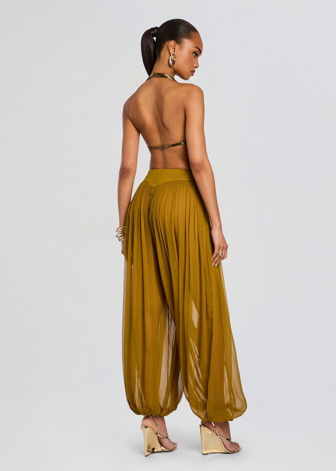 Completo pantaloni a gamba larga con peplo bianco