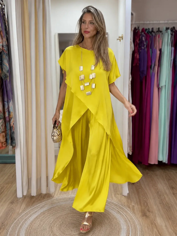 Completo a due pezzi fluido e drappeggiato