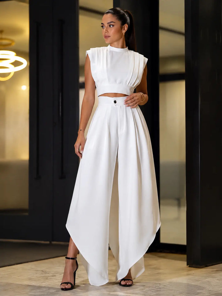 Completo due pezzi con drappeggio scolpito