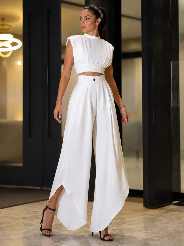 Completo due pezzi con drappeggio scolpito