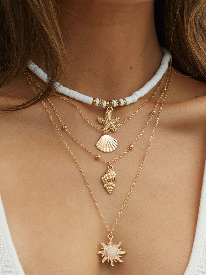 South Pacific Shell Starfish meerlaagse ketting goud
