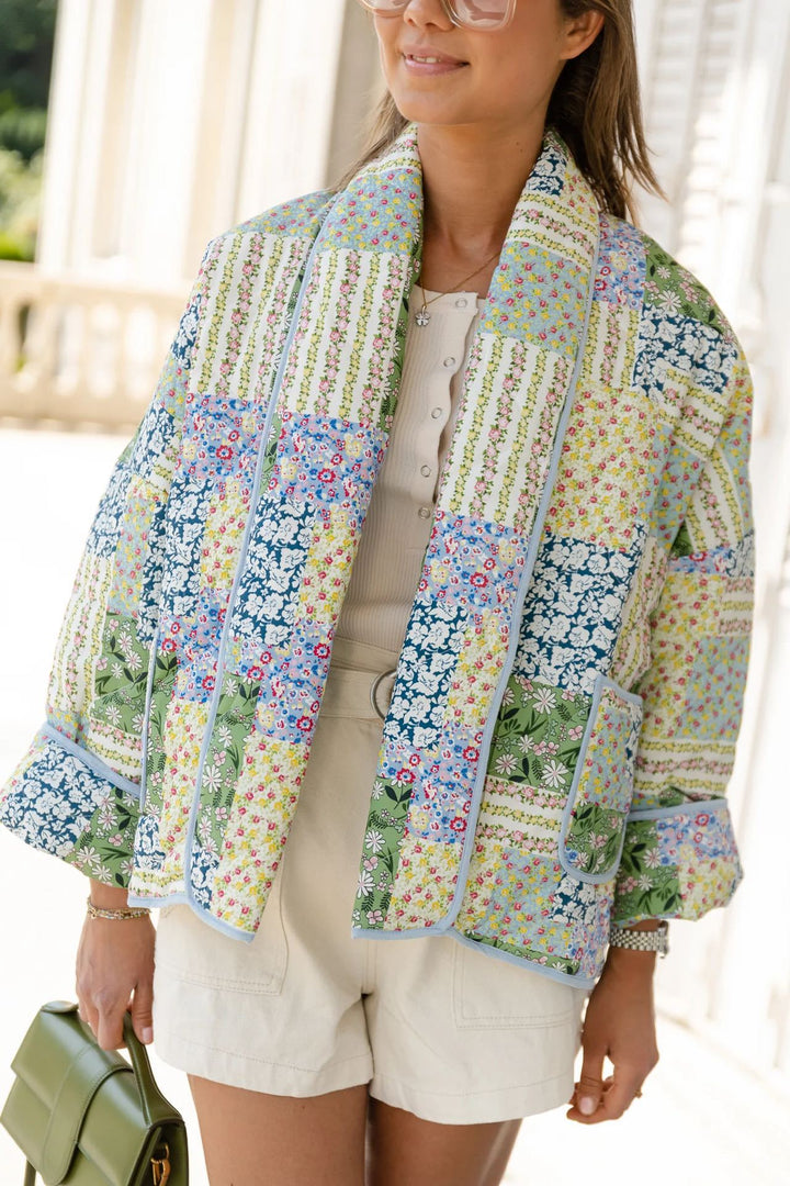 Jaqueta estampada em patchwork com estampa floral amarelo-verde