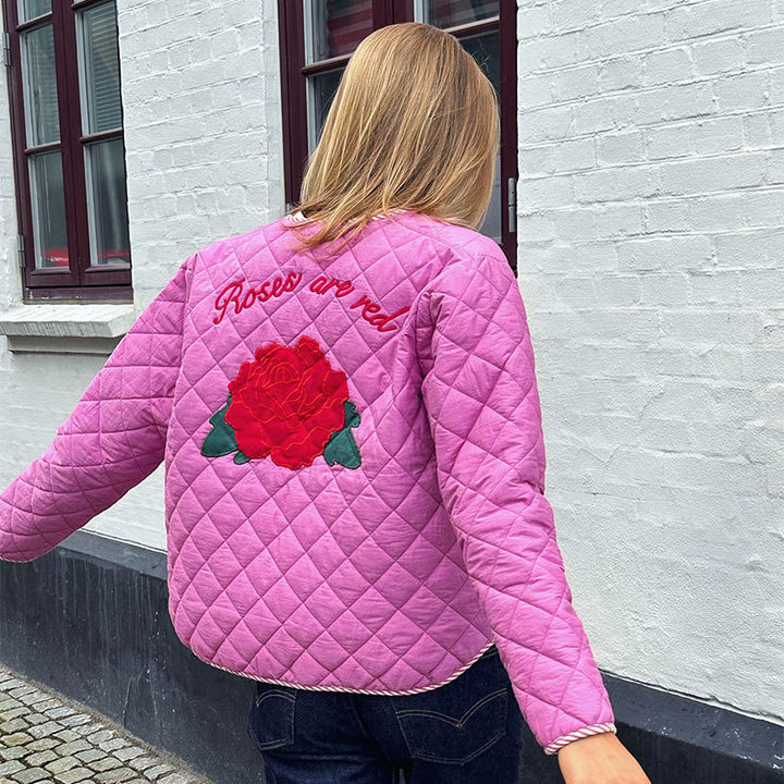 Veste fine rose avec nœud imprimé rose