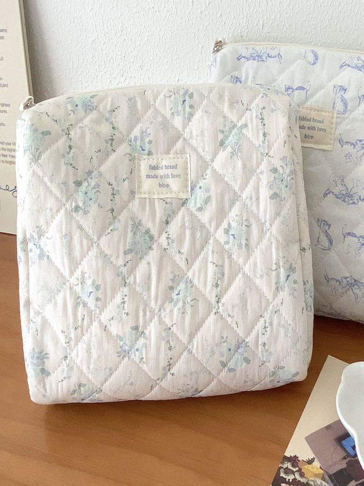 Neceser de maquillaje floral azul marino