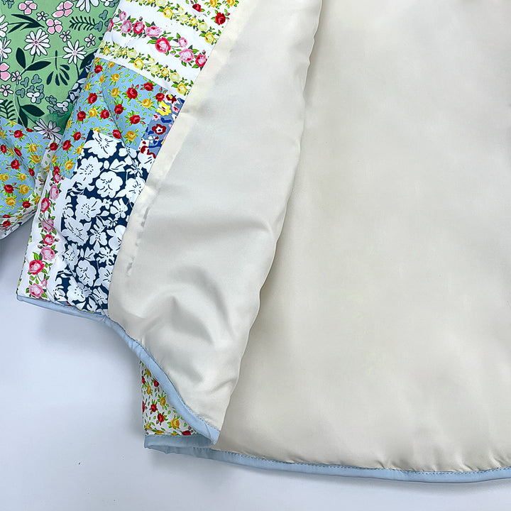 Jaqueta estampada em patchwork com estampa floral amarelo-verde