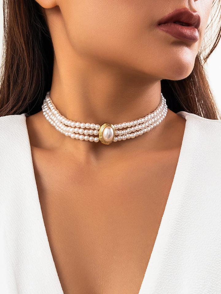 Kort halskjede med imiterte perler og turkis perler