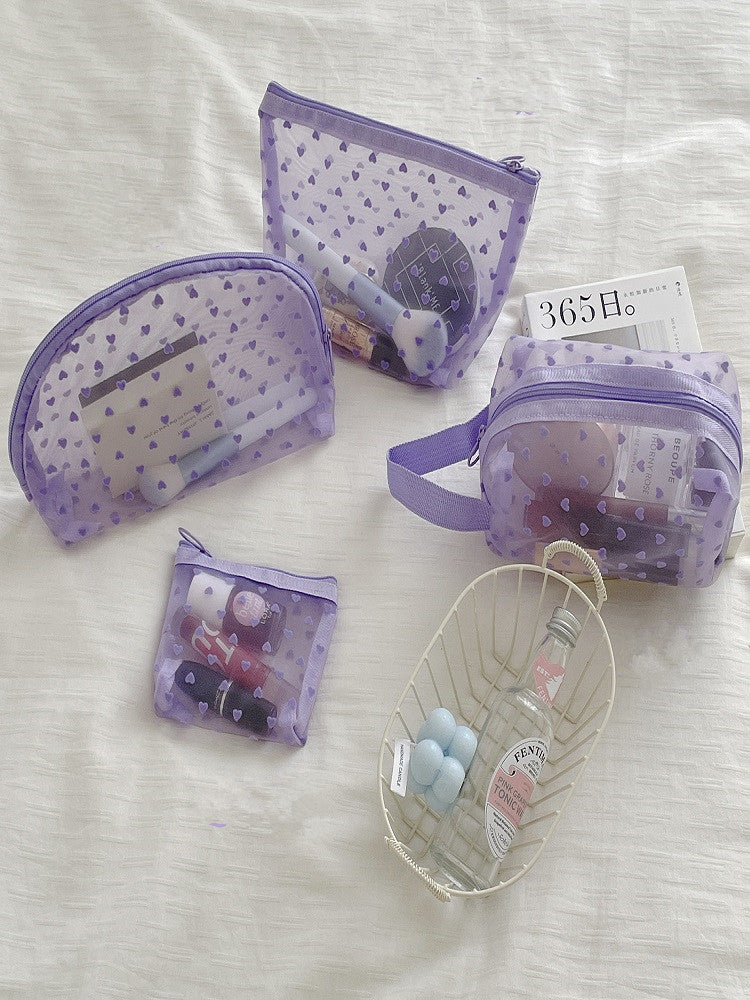 Bolsa de maquillaje de corazón transparente morado