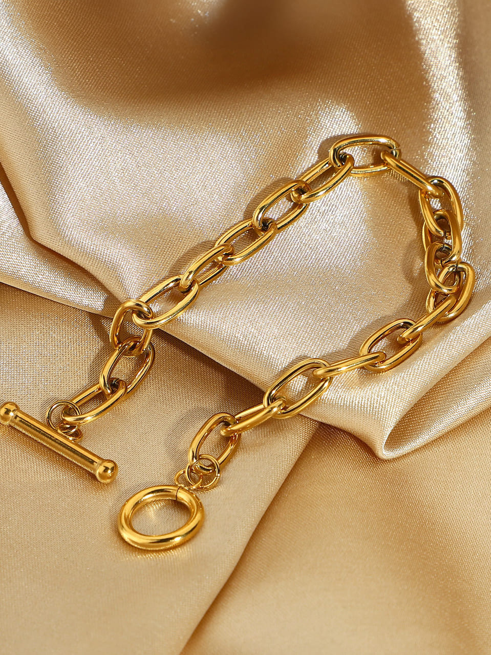 Bransoletka z prostokątnym ogniwem w kształcie litery T - złota