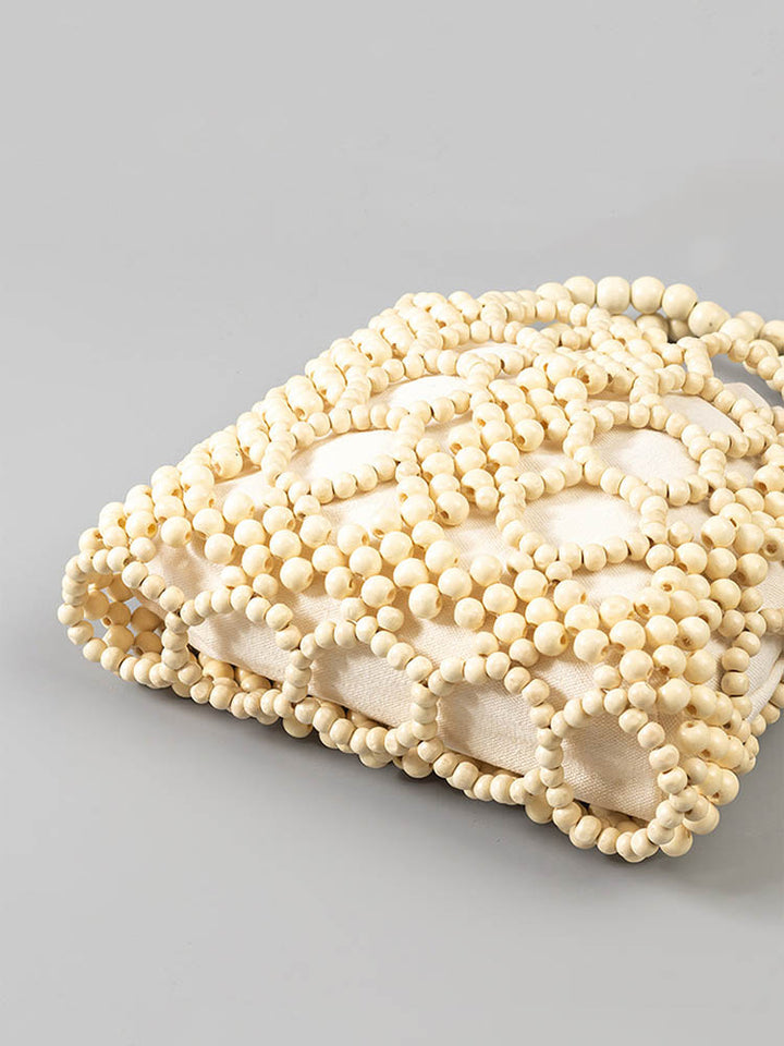 Ručně tkaná kabelka z dřevěných korálků