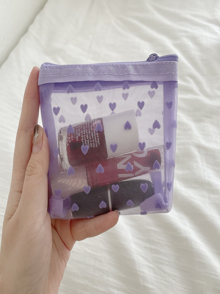 Bolsa de maquillaje de corazón transparente morado