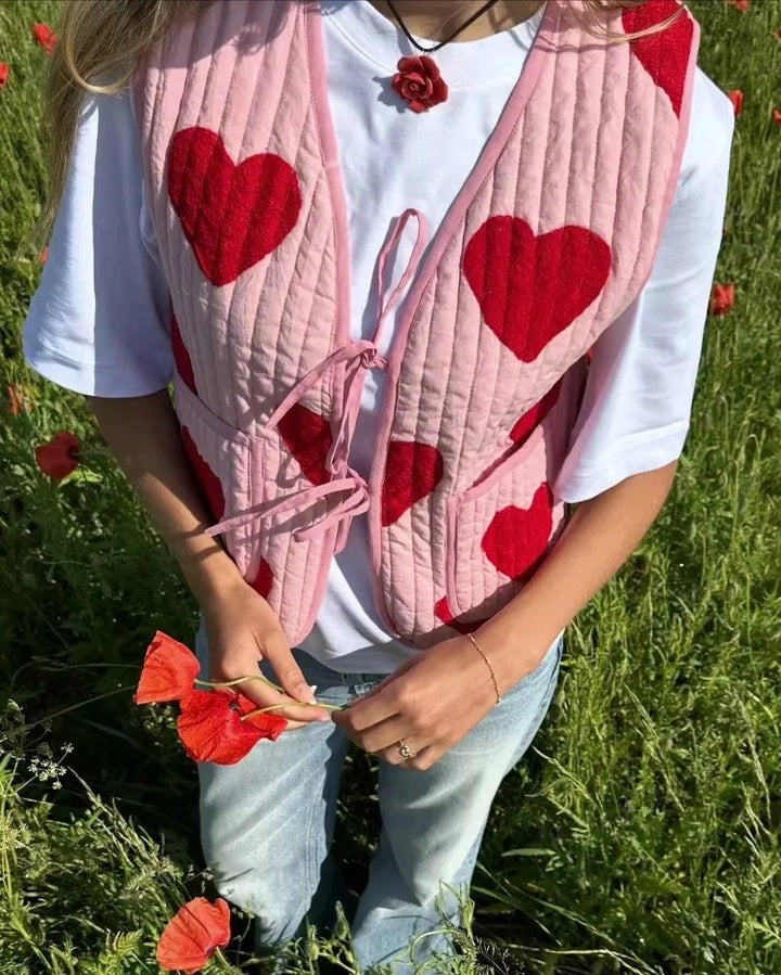 Gilet col V sans manches à imprimé coeur et nœud rose