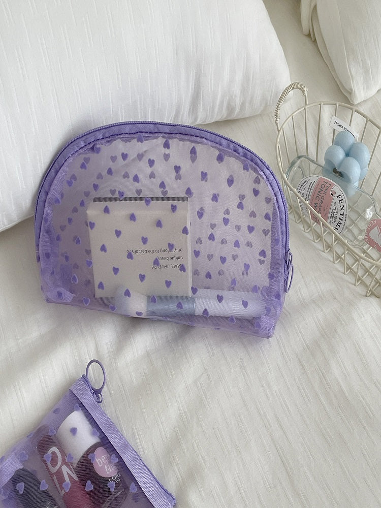 Bolsa de maquillaje de corazón transparente morado