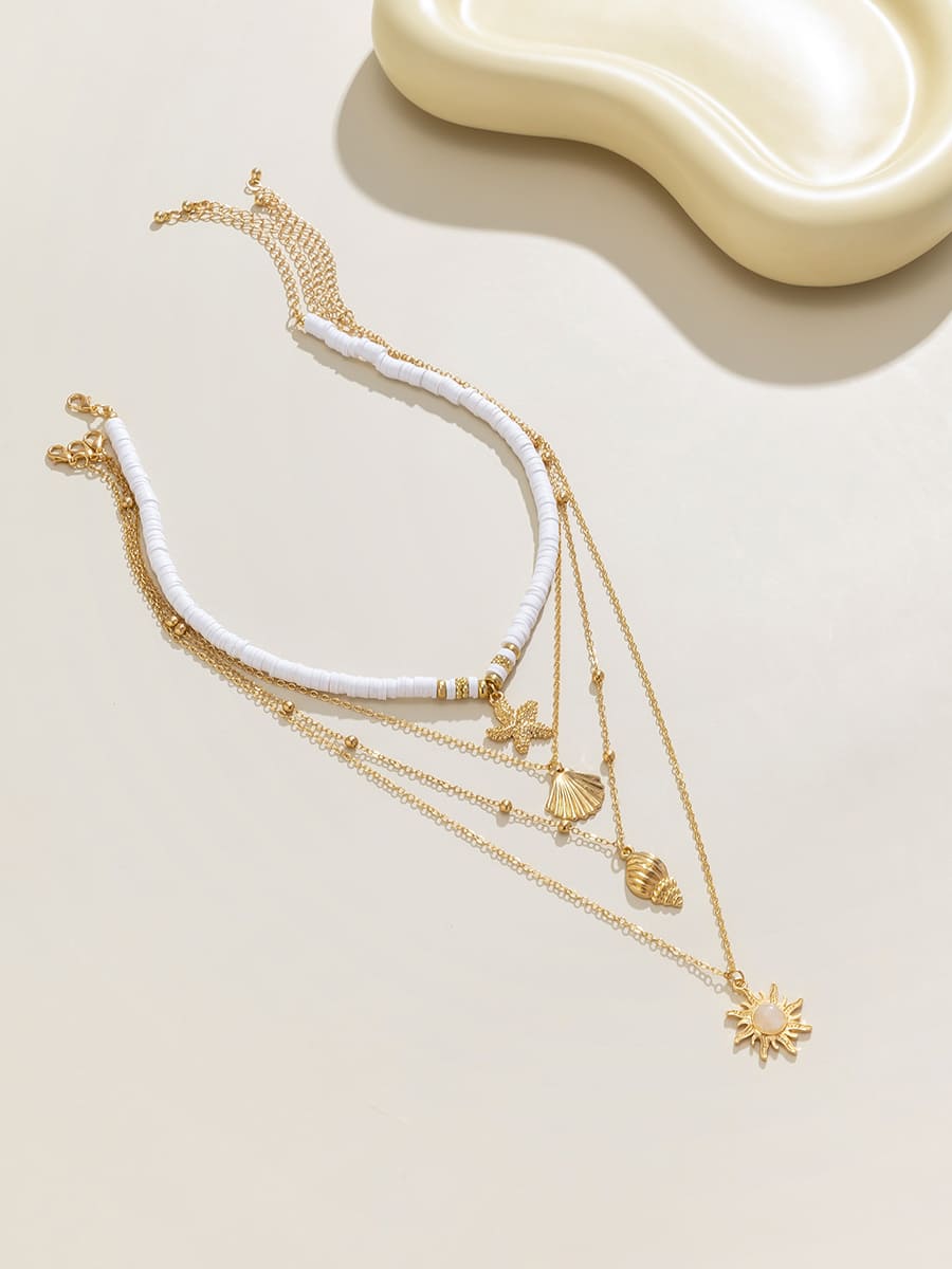 Südpazifik-Muschel-Seestern-Mehrschicht-Halskette aus Gold