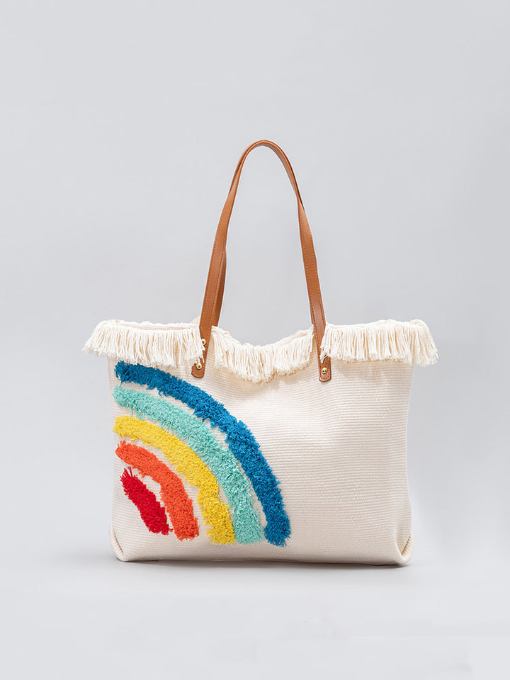 mulepose med broderet regnbuemønster