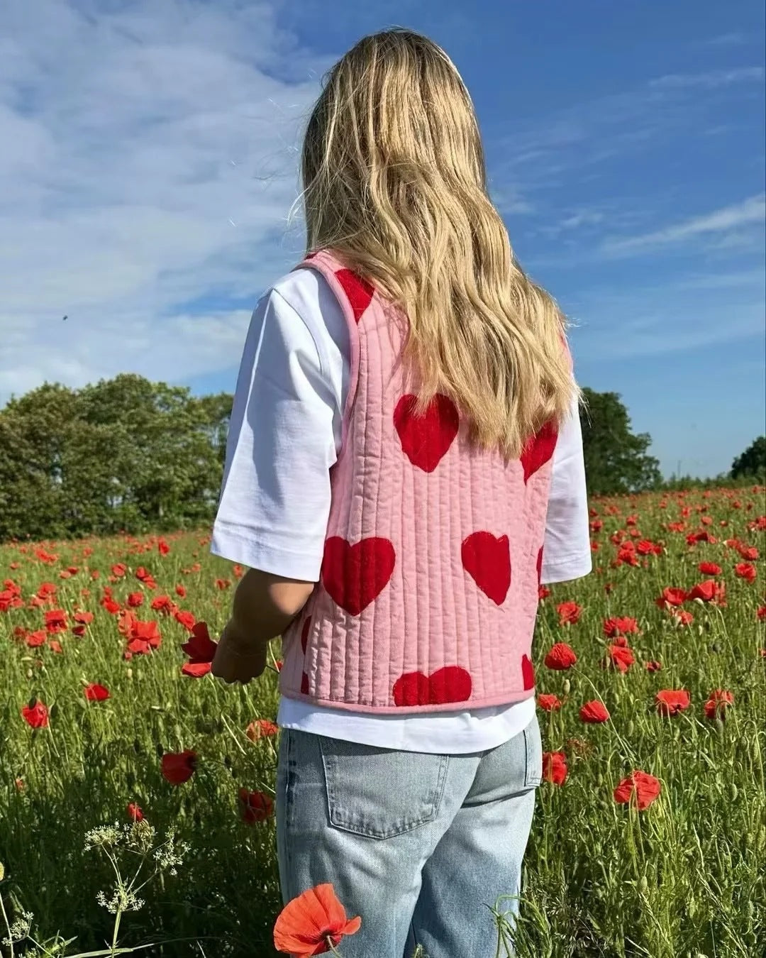 Gilet col V sans manches à imprimé coeur et nœud rose