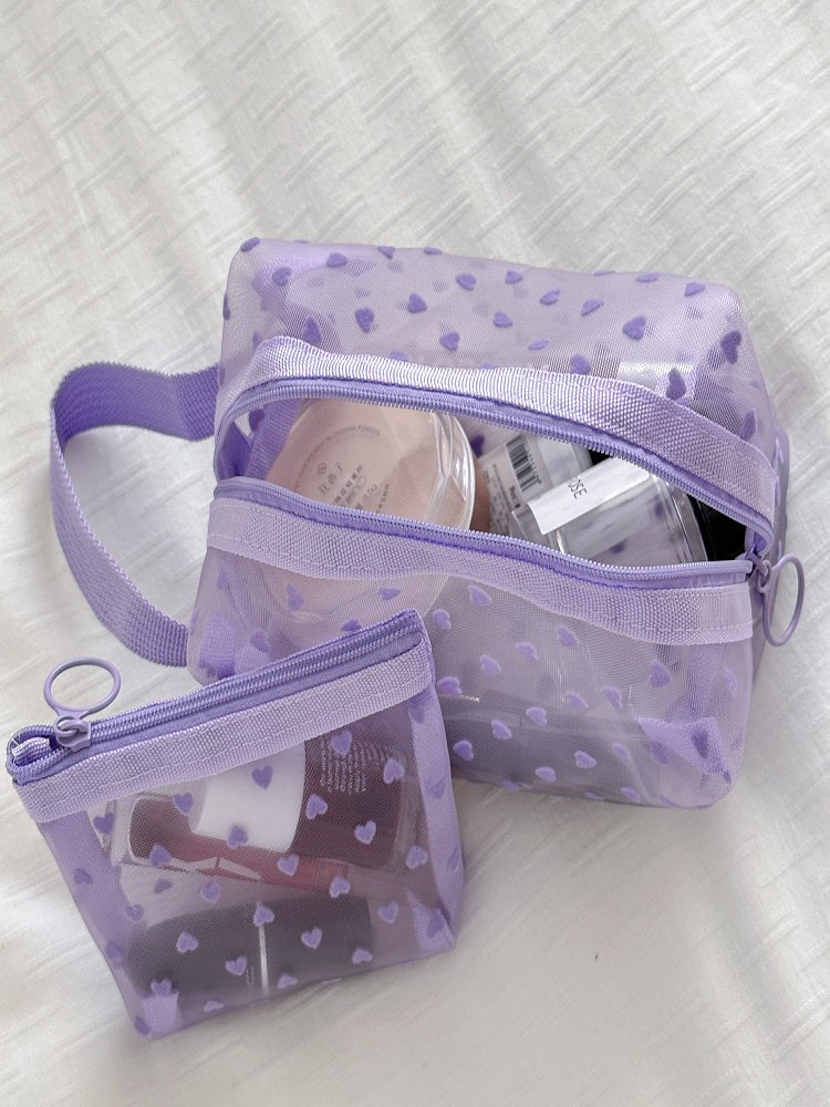 Bolsa de maquillaje de corazón transparente morado