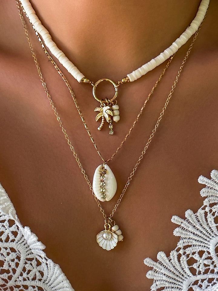 Collana multistrato con ciondolo conchiglia e girasole