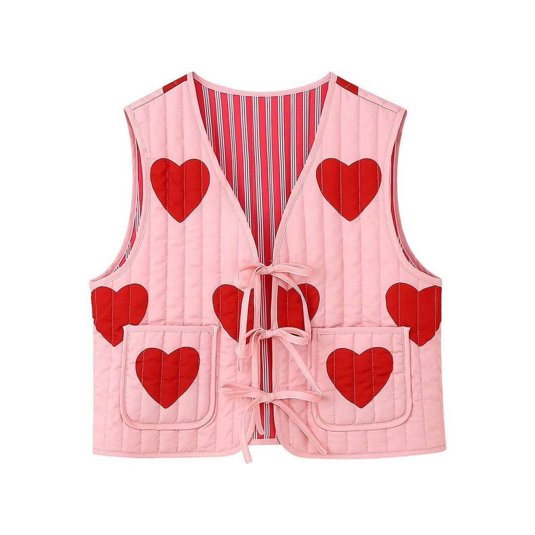 Gilet col V sans manches à imprimé coeur et nœud rose