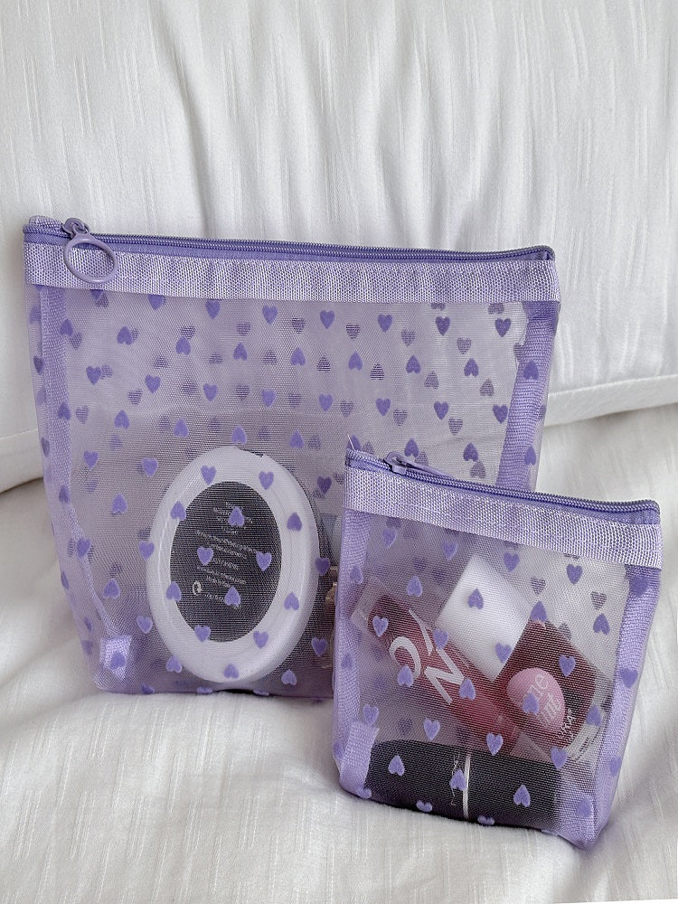 Bolsa de maquillaje de corazón transparente morado