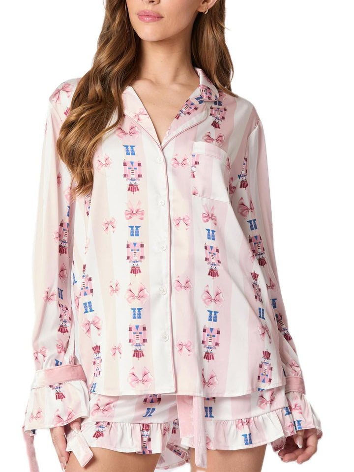 Conjunto de pijama rosa com punhos de laço