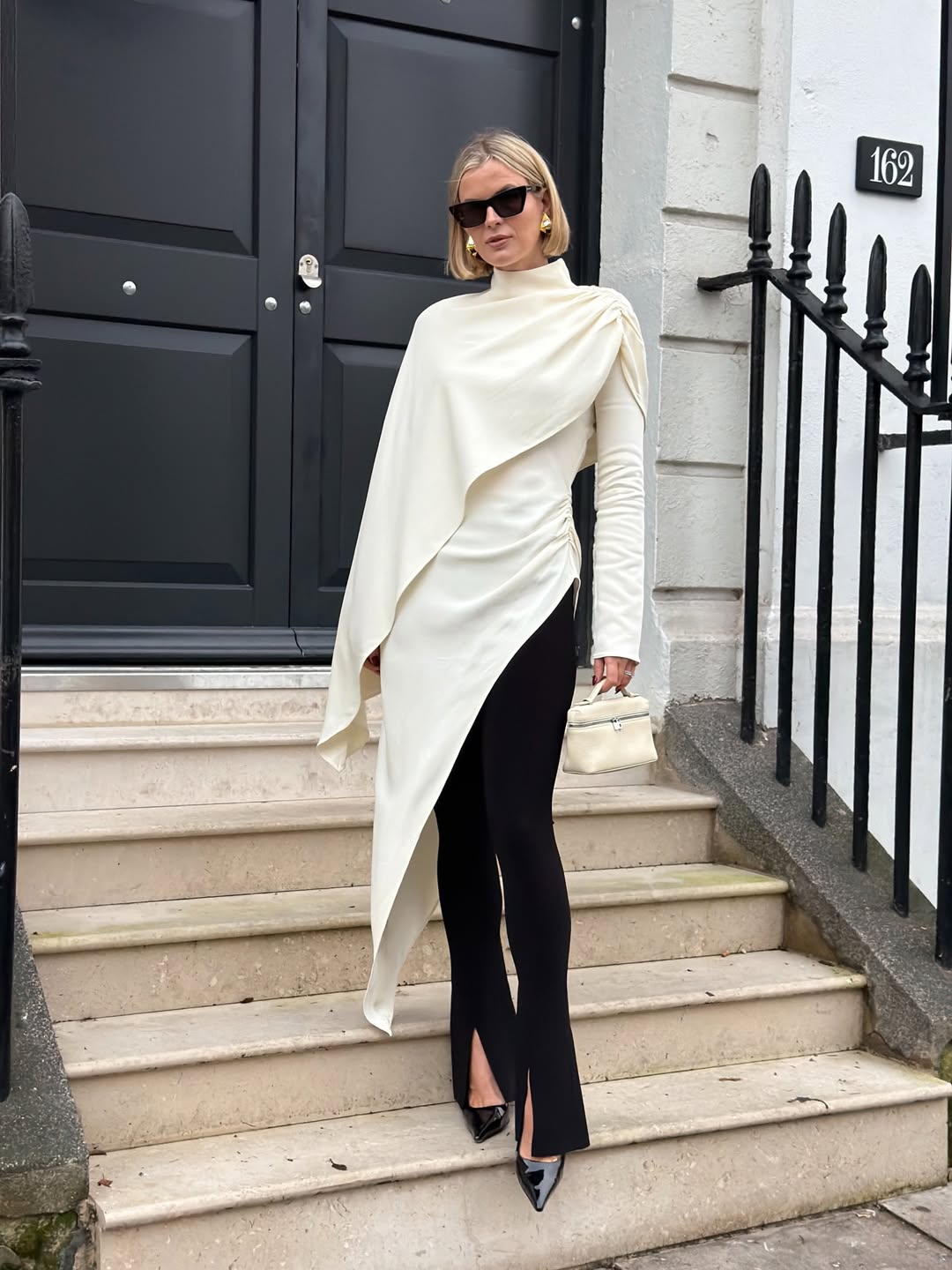 Asymmetric Cape High-Neck Top