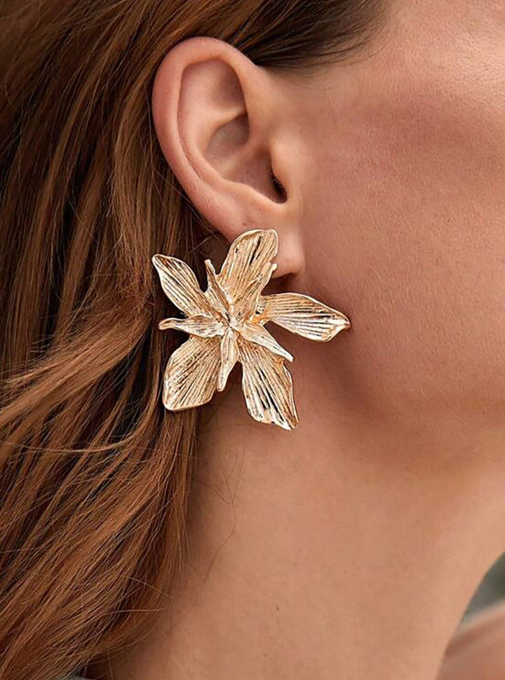 Boucles d'oreilles fleur en métal