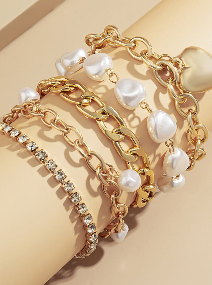 Ensemble de bracelets superposés avec chaîne en métal et perles