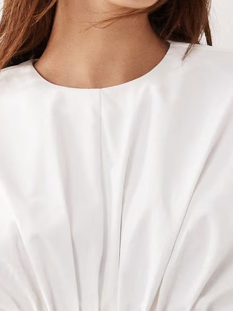 Pintuck bluse med åben ryg og peplum