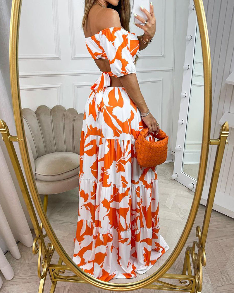 Off-the-shoulder maxi-jurk met print en uitsparingen