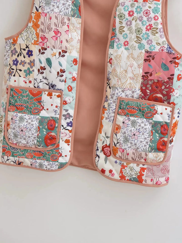 Patchwork vest med blomstertrykk