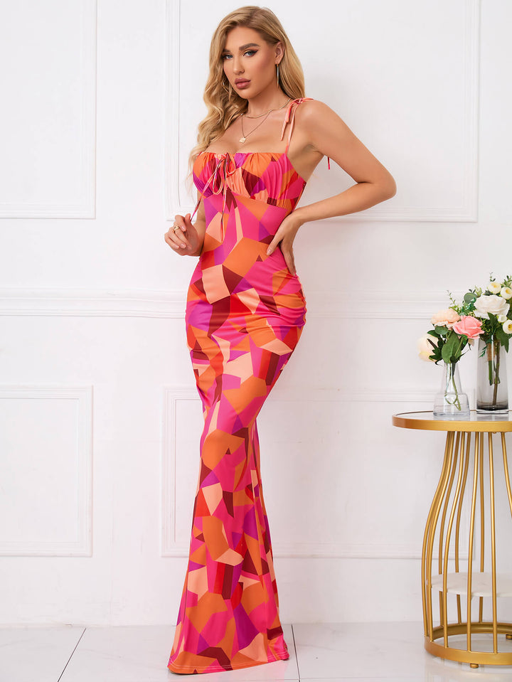 Robe de bal à imprimé floral avec ourlet en queue de poisson et épaules nouées